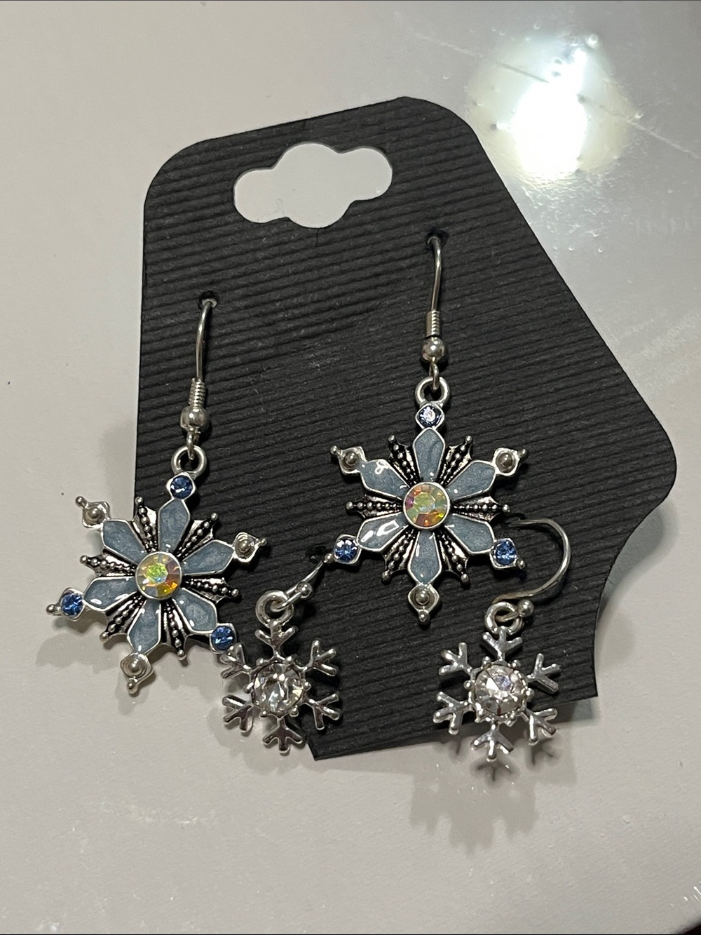Silver Snowflake Dangle Earrings with Blue Accents